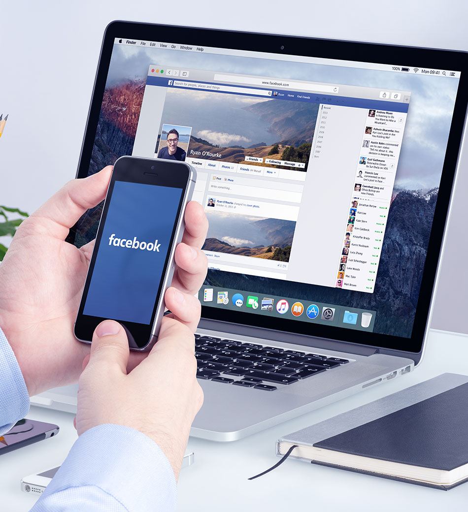 Facebook App On The Apple Iphone Display And Apple Macbook Pro
